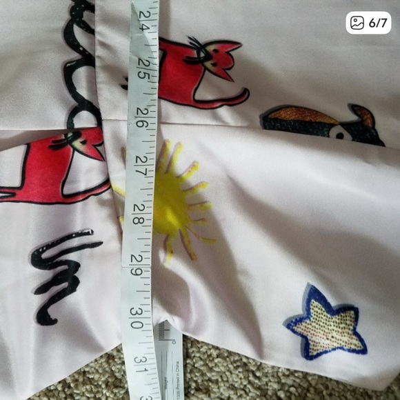 Whimsical Pink Midi Dress with Playful Prints - Picture 15 of 16